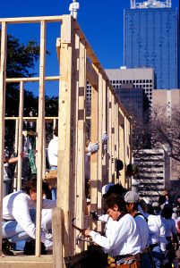 Habitat house being built by women in a parking lot at the Home Builders show. (Dallas Women Build 2000)
