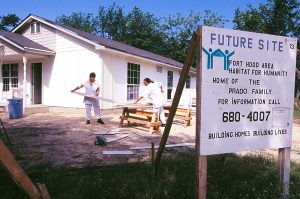 Women offenders from Gatesville Unit in Killeen, Texas, help with the construction of a Habitat house. (Prison Partnership 2001)