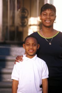 Future Habitat homeowner Tanya Henderson and her son Anthony White Jr.  (2003)