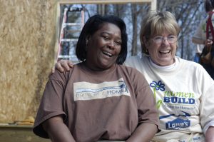 Lowe's Women Build PSA shoot with future homeowner Virginia Burden (brown t-shirt "Hammer it Home"), her family and volunteers.